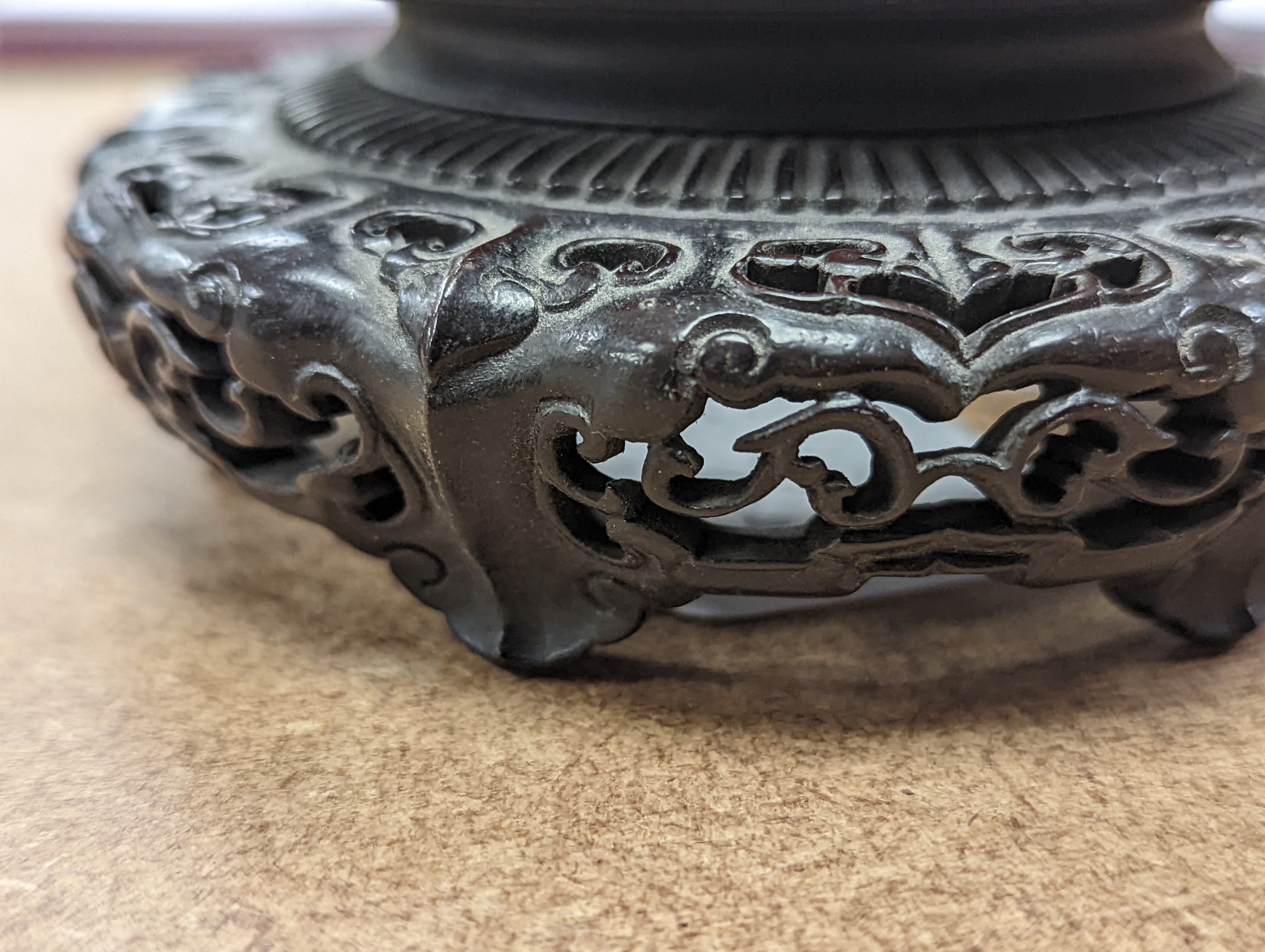 A fine 19th century Chinese hardwood stand, 11.4cm diameter